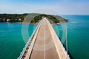 Scenic Aerial View of Bridge over Sea. bridge TECHO MORAKAT to Snake island KOH PUOS. Sihanoukville. Cambodia. Top view aerial photo