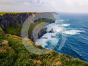 Scenic aerial view of Cliffs of Moher at sunrise