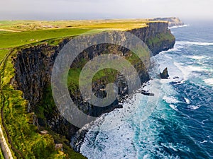 Scenic aerial view of Cliffs of Moher at sunrise