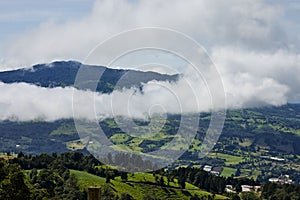 Scenic aerial view of clouds over the mountains, Grecia, Costa Rica photo