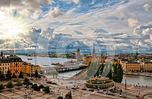 Scenic aerial view of Gamla Stan - Old Town - and Slussen in Stockholm at sunset photo