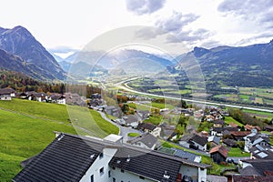 Scenic aerial view of hillside villages of Triesenberg and the river Rhine in Liechtenstein, an alpine country in Europe