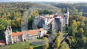 Scenic aerial view of impressive medieval Zleby castle on sunny autumn day, Kutna Hora district, Czech Republic