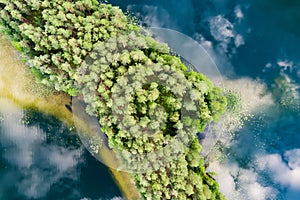 Scenic aerial view of Sciuro Ragas peninsula, separating White Lakajai and Black Lakajai lakes. Picturesque landscape of lakes and
