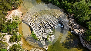 Scenic aerial view of Sculpture Falls via Barton Creek Greenbelt Trail photo