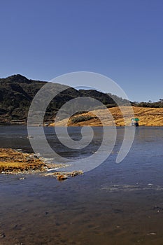 scenic alpine valley and PT Tso or penga teng tso lake surrounded by himalaya mountains