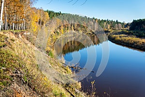 Scenic autumn colored river in country