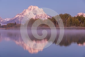 Scenic Autumn Sunrise Reflection in the Tetons