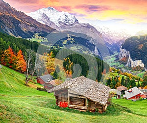 Scenic autumn view of picturesque alpine Wengen village and Lauterbrunnen Valley