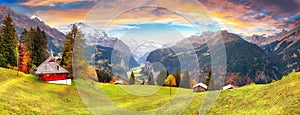 Scenic autumn view of picturesque alpine Wengen village and Lauterbrunnen Valley