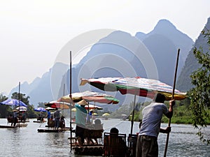 A scenic bamboo raft ride down the Yulong River near Chaolong China.