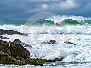 scenic beach at Esposende with waves in bad weather photo