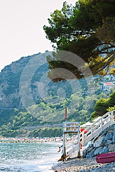 Scenic beach on a hot sunny day in Alassio, Italy