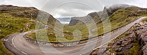 Scenic Bealach na Ba road winding through the mountains in Scotland