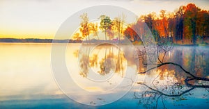 Scenic beautiful fall autumn lake landscape scenery at sundown