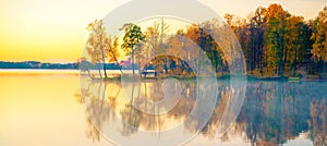 Scenic beautiful fall autumn lake landscape scenery at sundown