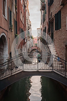 Scenic Bridge Over Canal in Venice, Italy with Unspecified Architectural Style and Surroundings