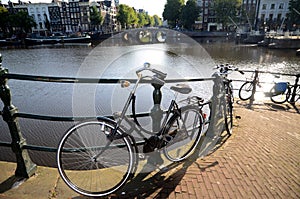 Scenic Bycicle in an Amsterdam Canal photo