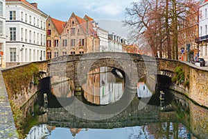 Scenic city view of Bruges canal and bridge