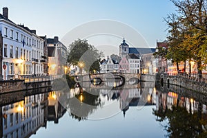 Scenic city view of Bruges canal at night