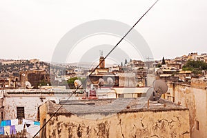 Scenic cityscape with old yellow buildings in the Medina of Fez, Marocco