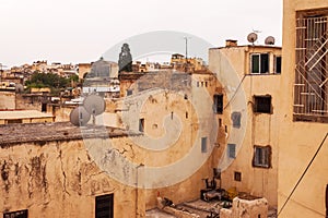 Scenic cityscape with old yellow buildings in the Medina of Fez, Marocco