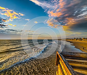 Scenic clouds over Newport Beach at sunset photo