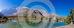 Scenic crystal lake panorama in Fan mountains in Pamir, Tajikistan