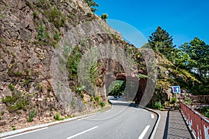 scenic, devils rock iwith street tunnel n the vosges region of france photo