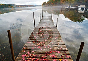 Scenic Dock over New England Lake in Fall