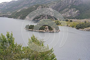 Scenic and dramatic panorama of Lysefjord Lysefjorden fjord canyon landscape in Norway in summer