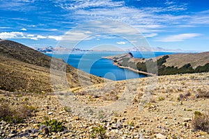 Scenic dramatic sky in winter season at Challapampa Bay on Island of the Sun, Titicaca Lake, among the most scenic travel destinat