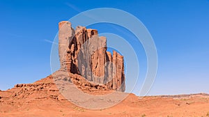 Scenic Drive on Dirt Road through Monument Valley, The famous Buttes of Navajo tribal Park, Utah - Arizona, USA. Scenic road and