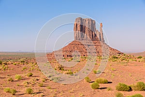 Scenic Drive on Dirt Road through Monument Valley, The famous Buttes of Navajo tribal Park, Utah - Arizona, USA. Scenic road and