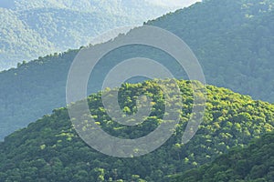 Scenic drive from Lane Pinnacle Overlook on Blue Ridge Parkway , zoom at top of mountain.