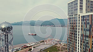 scenic drone shot of black sea from Batumi, Alphabet Tower, Adjara, Georgia