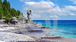 Scenic Fathom Five National Marine Park and famous Flowerpot Island accessible by tourist bot from Tobermory