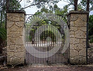 Scenic forged gate entrance in Yanchep National Park