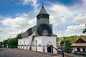 Scenic half wooden church in a historic small hungarian village
