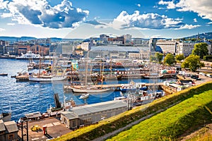 Scenic harbor of Oslo in Aker Brygge view from the hill photo