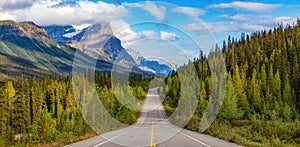 Scenic Highway in Canadian Rocky Mountains. Sunny Cloudy day. Banff, Alberta, Canada