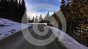 Scenic Highway surrounded by Mountains, Trees and Snow. Sunrise, Duffy Lake Road. Near Pemberton