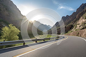 scenic highway with twisty curves and scenic view of the mountains