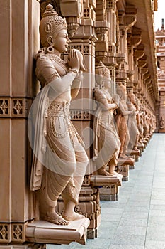 Scenic hindu statues decorating Akshardham Mahamandir temple at BAPS Swaminarayan Akshardham photo
