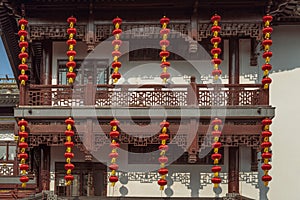 Scenic of historic architecture with strings of lanterns in Shanghai