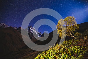 Scenic image of night sky over the peak Ushba. Location Mestia, Upper Svaneti, Georgia, Europe