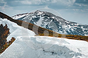 Scenic image of snowy peaks in the sunlight. Location Ukraine, Europe