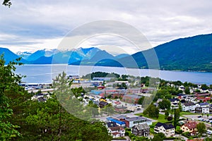 Scenic landscape Andalsnes city located on shores of Romsdal Fjord between the picturesque mountains. View from Rampestreken