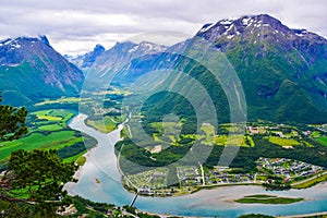Scenic landscape Andalsnes city located on shores of Romsdal Fjord between the picturesque mountains. View from Rampestreken