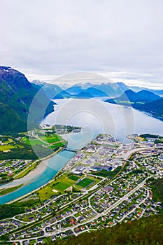 Scenic landscape Andalsnes city located on shores of Romsdal Fjord between the picturesque mountains. View from Rampestreken